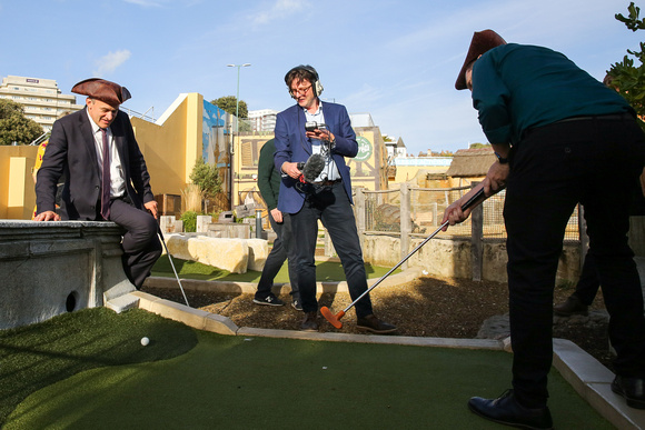 Liberal Democrats Party Autumn Conference at Bournemouth International Centre -  Matt Chorley from Times Radio interviews Ed Davey over a game of crazy golf at Smugglers Cove Adventure Golf