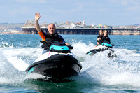 Ed Davey Arrives In Brighton On A Jet Ski